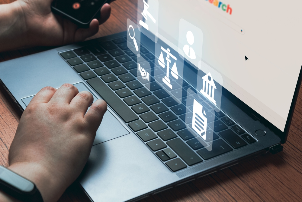 A person browsing verified lawyer profiles on a laptop or mobile and selecting a consultation